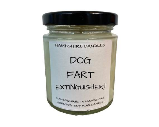 Glass jar candle with the funny quote "Dog Fart Extinguisher" on the front, perfect for dog owners.